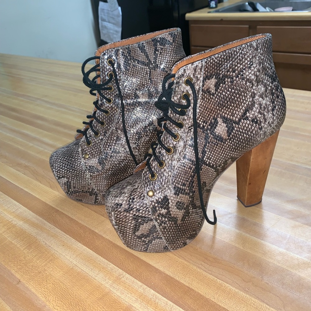 Trendy snake skin platform Jeffery Campbell’s